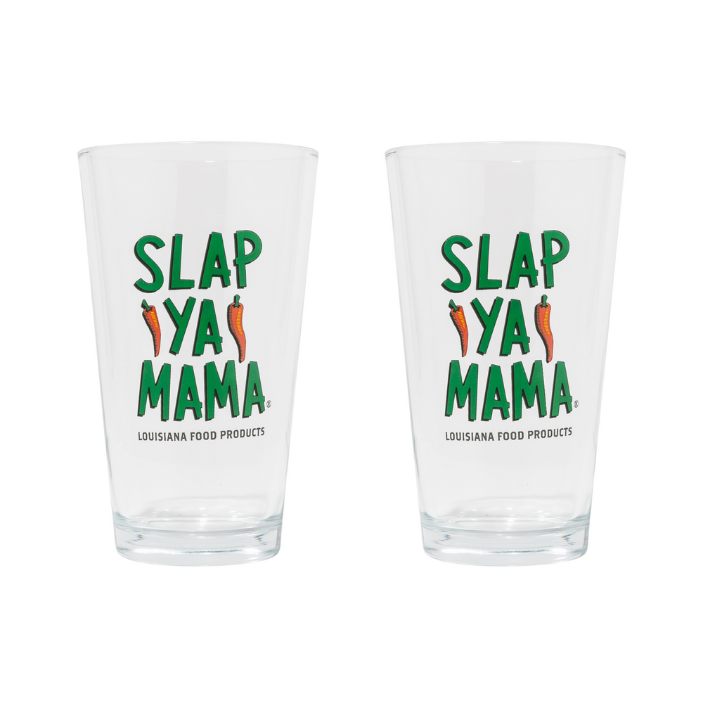 Slap Ya Mama pint glass with a green logo, empty, displayed on a white background. 