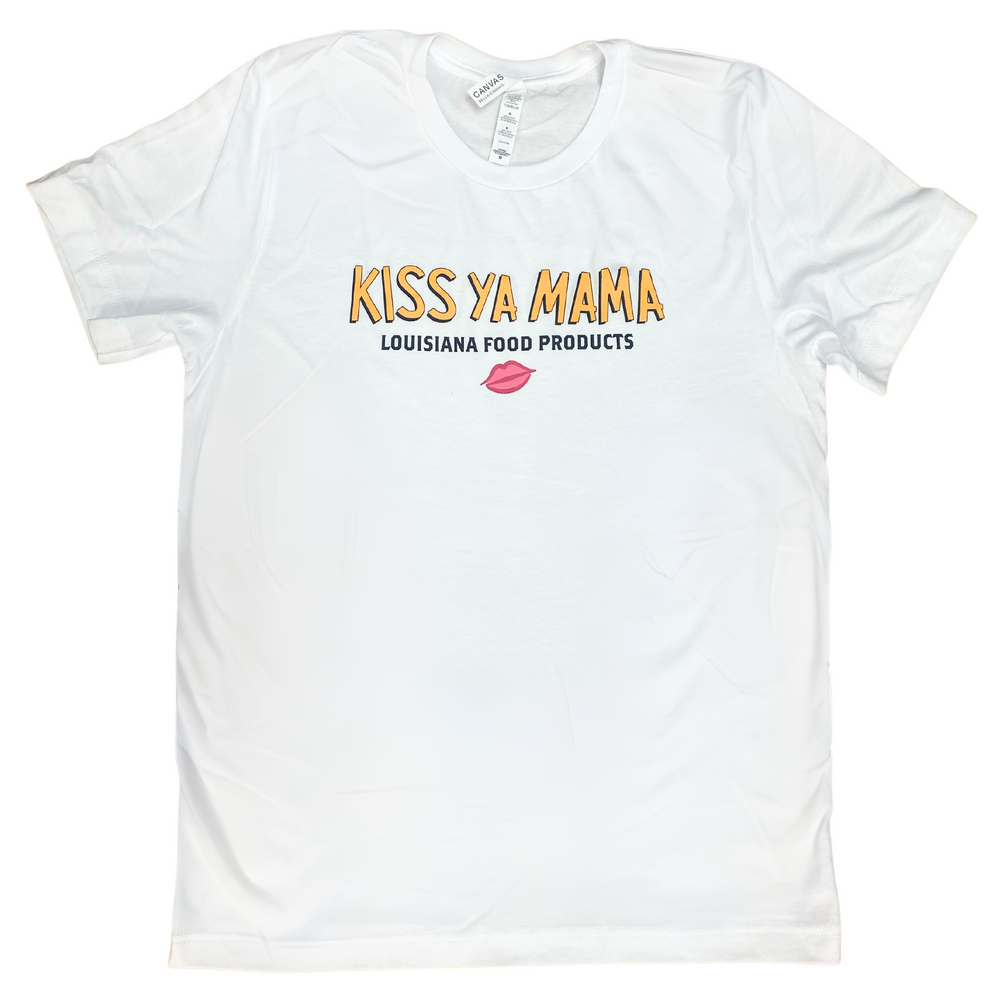 White Kiss Ya Mama shirt featuring the yellow Kiss Ya Mama logo on the chest, with 'Louisiana Food Products' in black text underneath and a pink lips graphic below that.