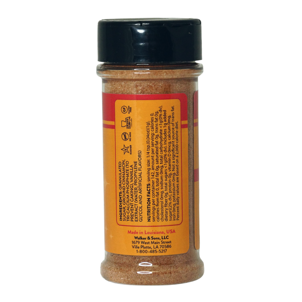 
                  
                    Load image into Gallery viewer, Nutrition Facts panel on the back of the Kiss Ya Mama Cinnamon Sugar canister, listing serving size, calories, sugars, and other nutritional information.
                  
                