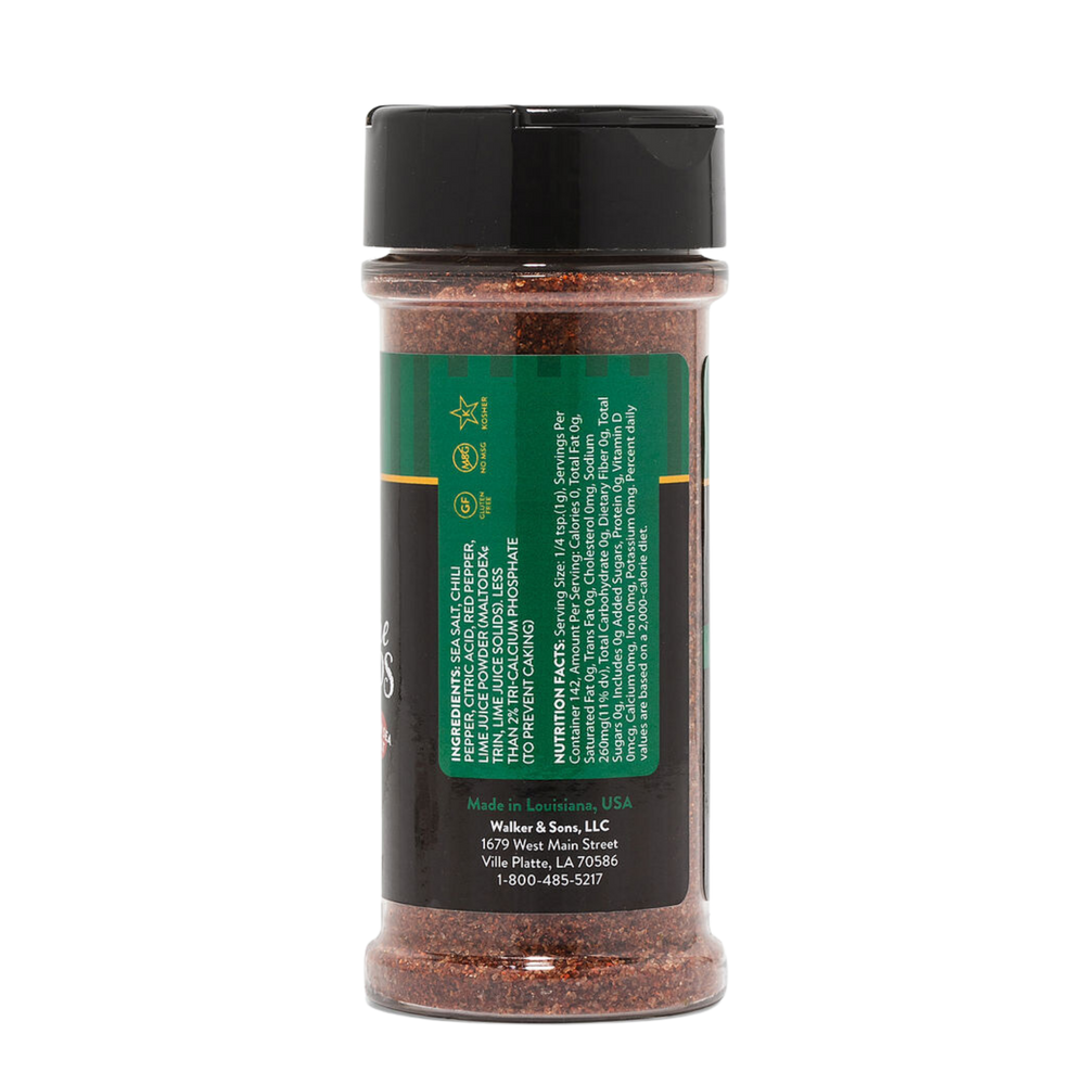 
                  
                    Load image into Gallery viewer, Nutrition Facts panel on the back of Slap Ya Mama Chili Lime Signature Blend plastic canister, listing serving size, calories, sodium, and other nutritional information.
                  
                