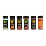 Signature Blend Kiss Ya Mama Combo Box featuring one of each seasoning: Chili Lime (5oz), Blackened (4.5oz), Steakhouse (3.5oz), Taco & Fajita (4.5oz), Garlic Salt (5oz), and Kiss Ya Mama Cinnamon Sugar (5oz), all displayed  on a white background