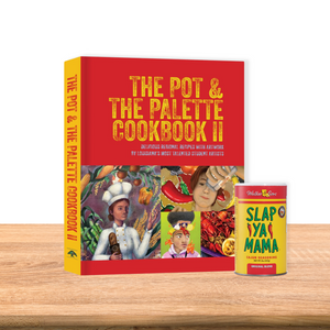 
                  
                    Load image into Gallery viewer, The Pot &amp;amp; The Palette Cookbook II,&amp;#39; placed on a kitchen counter next to a canister of Slap Ya Mama Original Blend Seasoning, styled for a vibrant and inviting kitchen scene.
                  
                