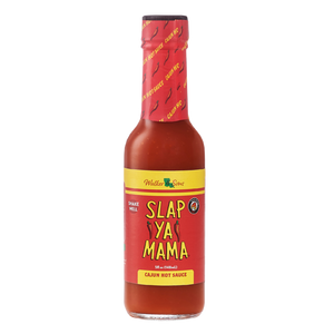 Slap Ya Mama Hot Sauce bottle with a red label, featuring yellow Slap Ya Mama logo and text reading 'Cajun Hot Sauce' below the logo